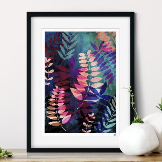 Framed art print featuring layered palm leaves in pink, blue and green.